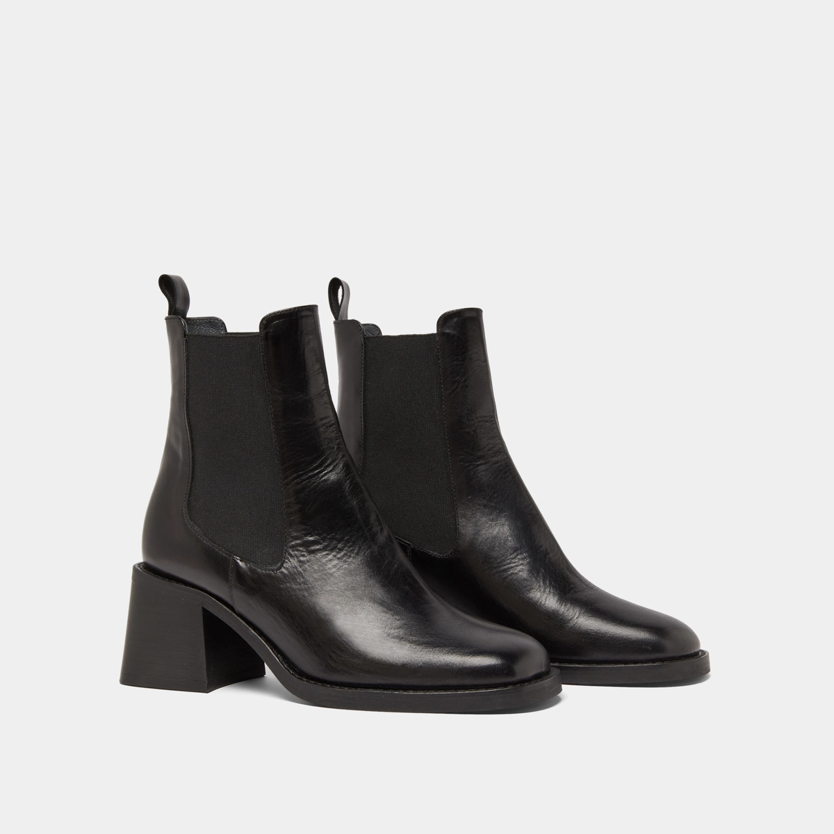 Ankle boots with elastics and chunky heels in black leather | DUCK