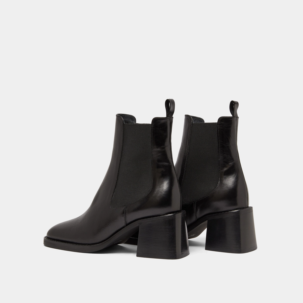 Ankle boots with elastics and chunky heels in black leather | DUCK