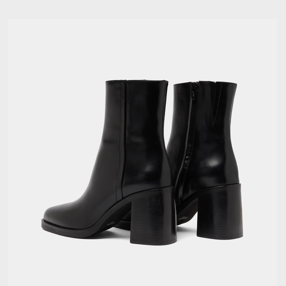 Ankle boots with heels in black leather | DOLOR