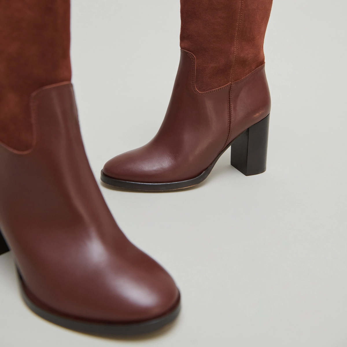 Heeled boots in cognac leather and suede | DOWN