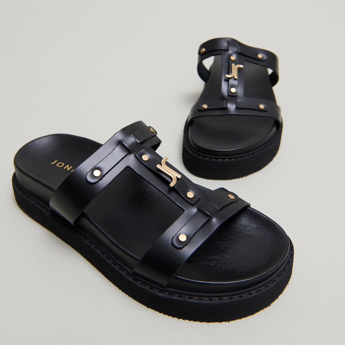 Platform sandals in black glazed leather | LUANA