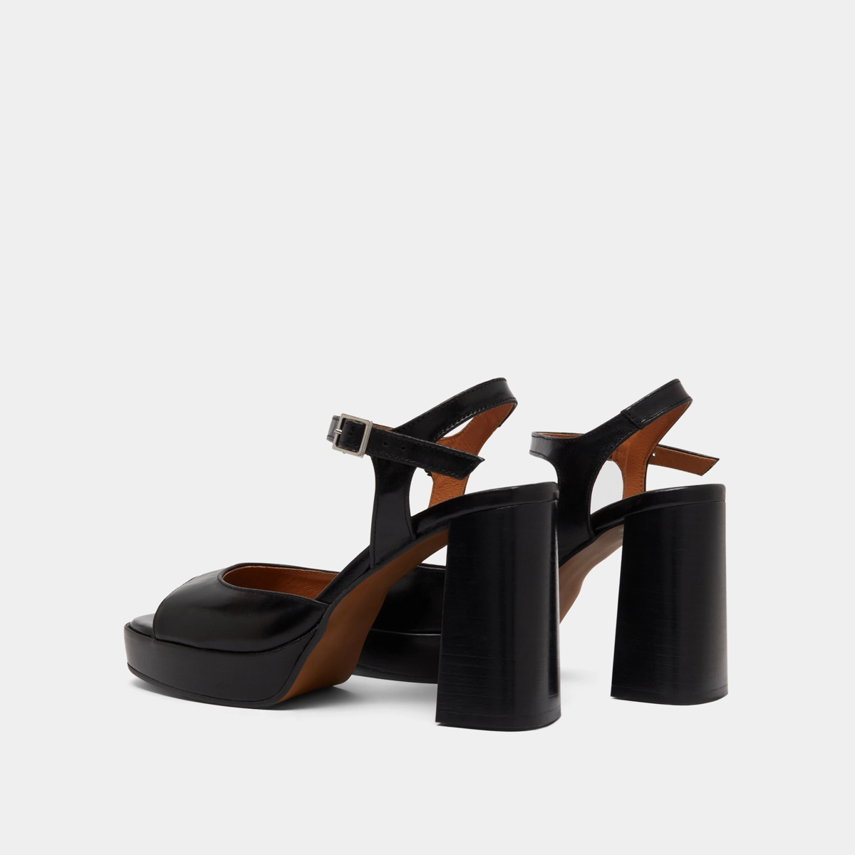 High-heeled sandals and platforms in black leather | BAMBA