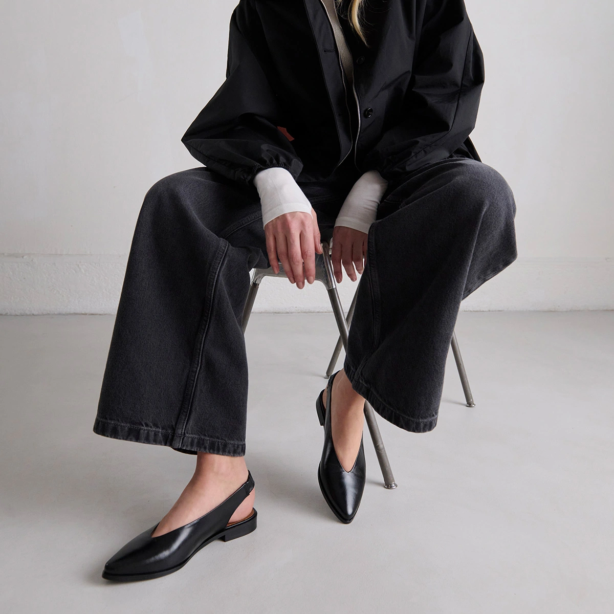 Ballet flats with open backs in black leather | ACAJOU
