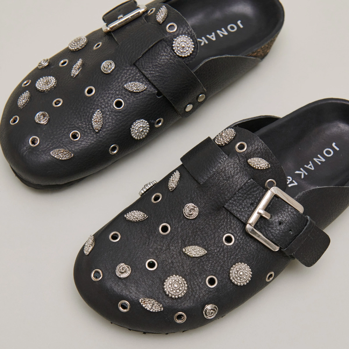 Mules with silver details in black grained leather | WASILA