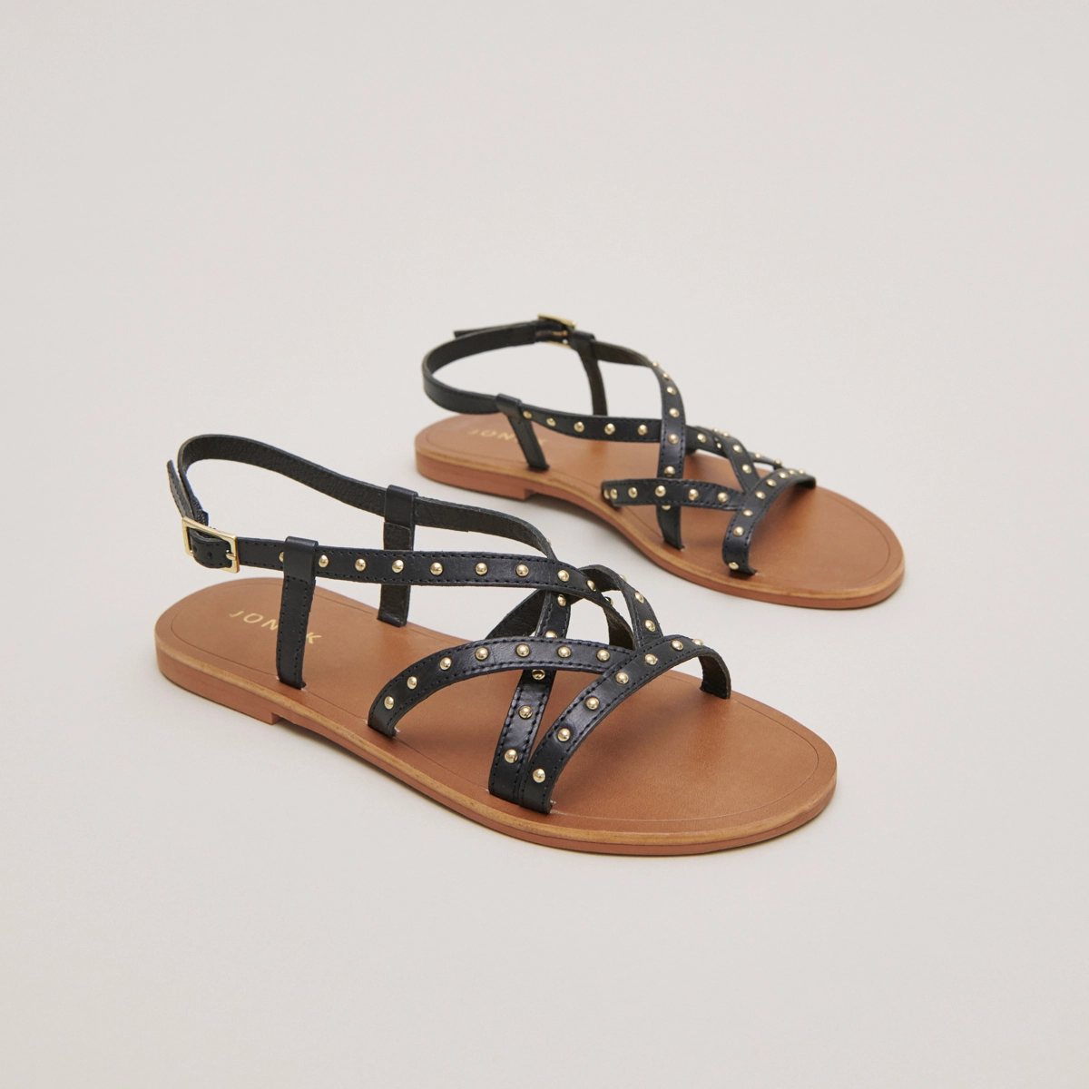 Plagettes with thin straps in black leather | WATERLOO