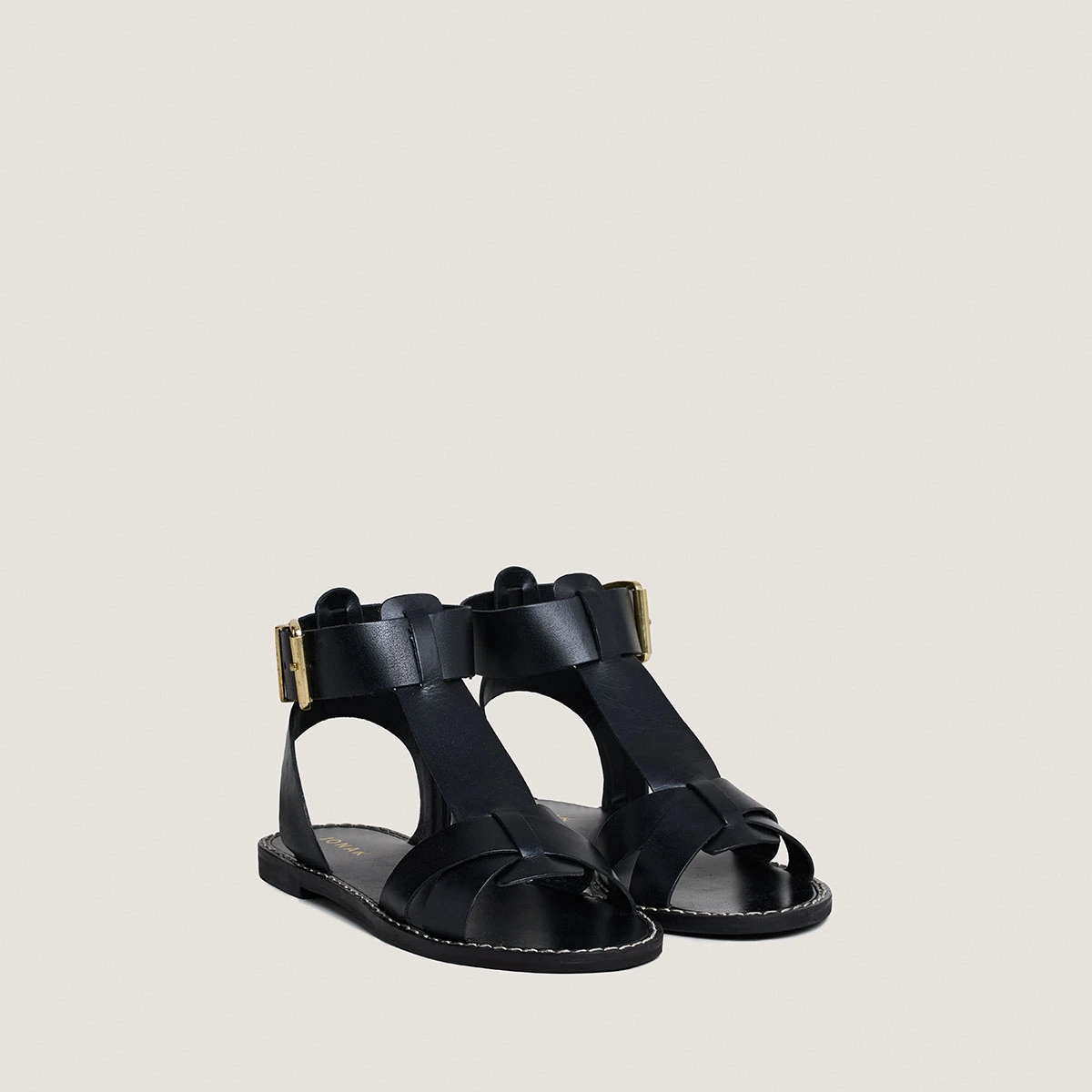 Buckle and strap sandals in black leather | WHISPER