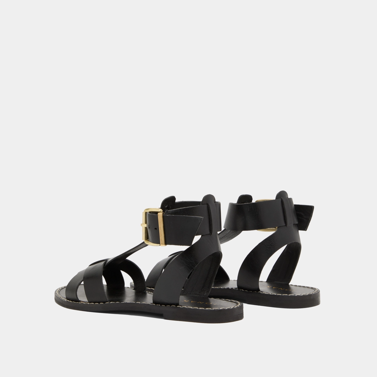 Buckle and strap sandals in black leather | WHISPER