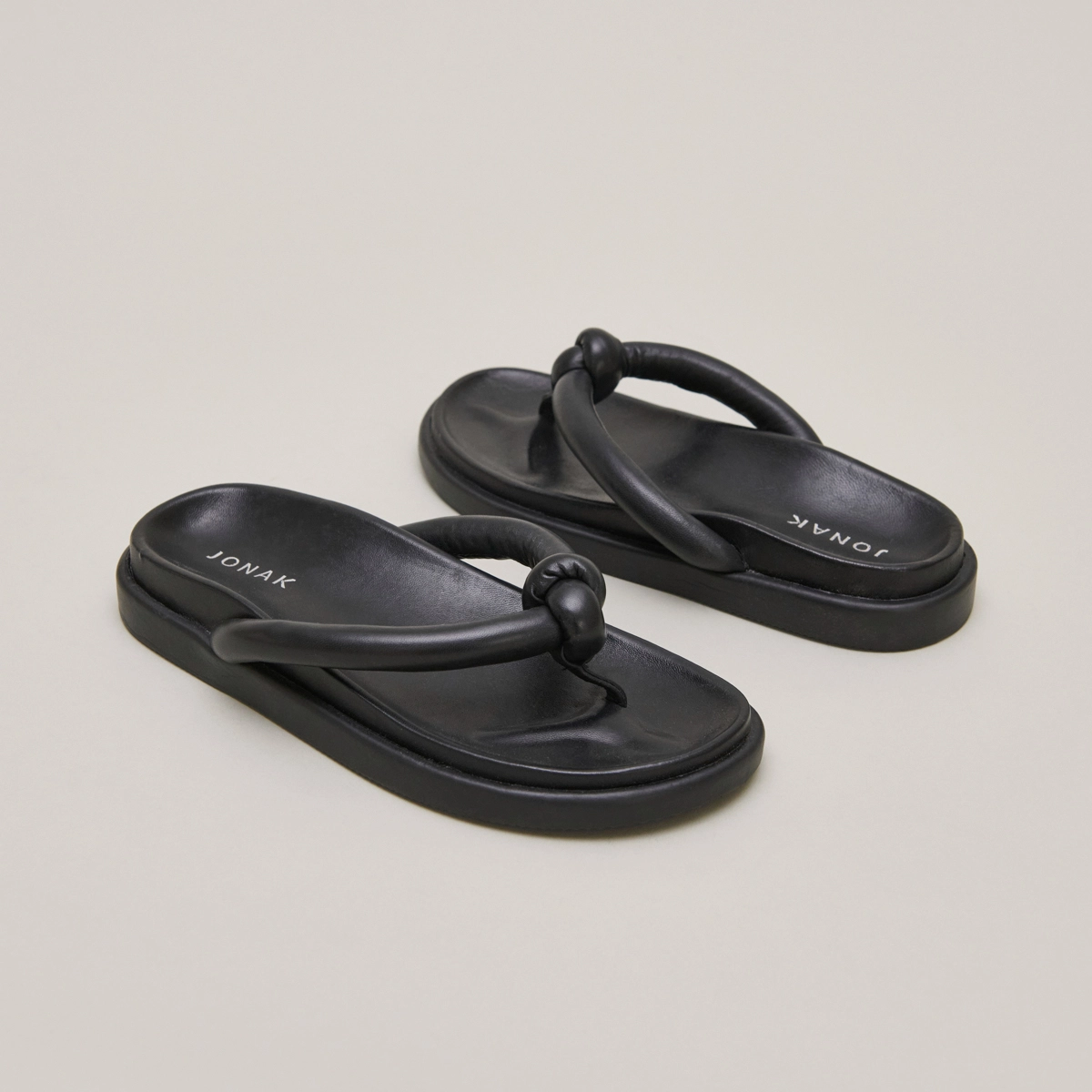 Mules with straps in black leather | WOODLAND