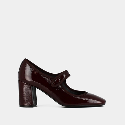 Heeled babies with big buckle straps in black pleated patent leather | drancy