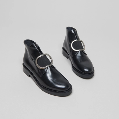 Boots with heels in black leather | dictee