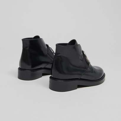 Boots with heels in black leather | dictee