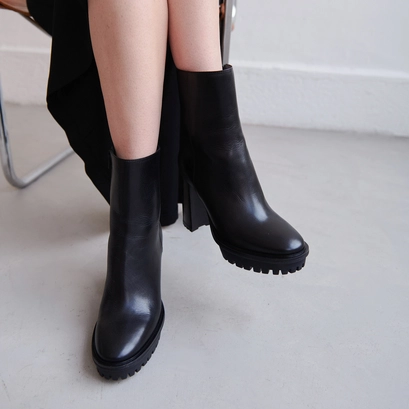 Ankle boots boots with heels and notched soles in black leather | donatien