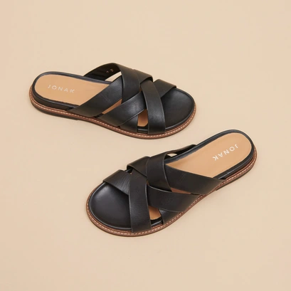 Mules with wide straps in black leather | alexandre