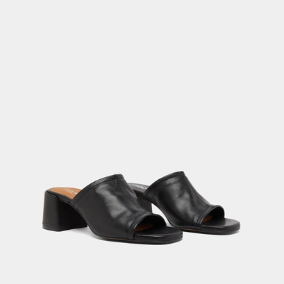 Mules with heels and open toes in black leather | butterfly