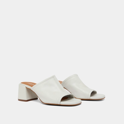 Mules with heels and open toes in white leather | BUTTERFLY