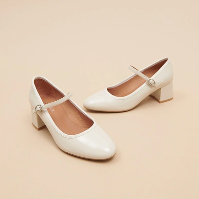 Heeled babies in ecru patent | DALMATIE