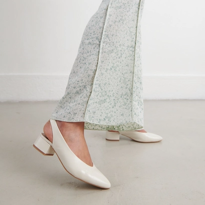 Ballet flats with open backs in ecru distressed leather | vince