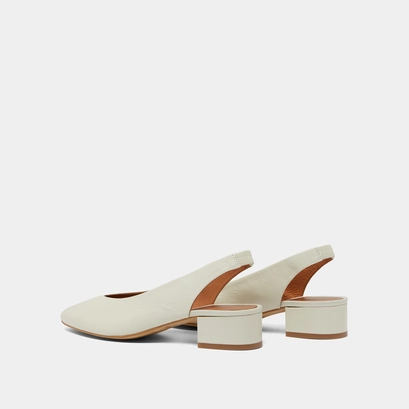 Ballet flats with open backs in ecru distressed leather | vince