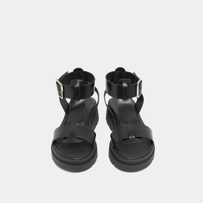 Platform sandals with thick straps in black glazed leather | lille