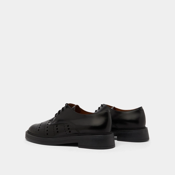 Pierced derbies in glazed black leather | AMARANTE