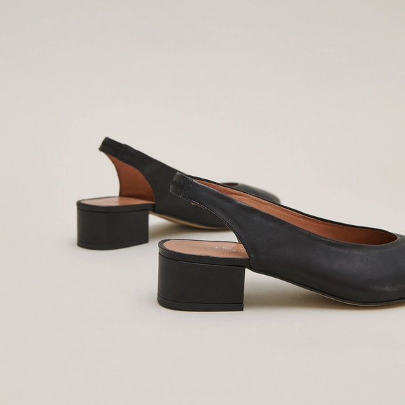 Ballet flats with open backs in black leather | VINCE