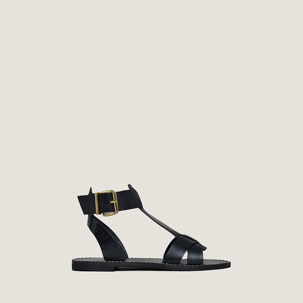 Buckle and strap sandals in black leather | WHISPER