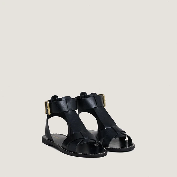 Buckle and strap sandals in black leather | WHISPER