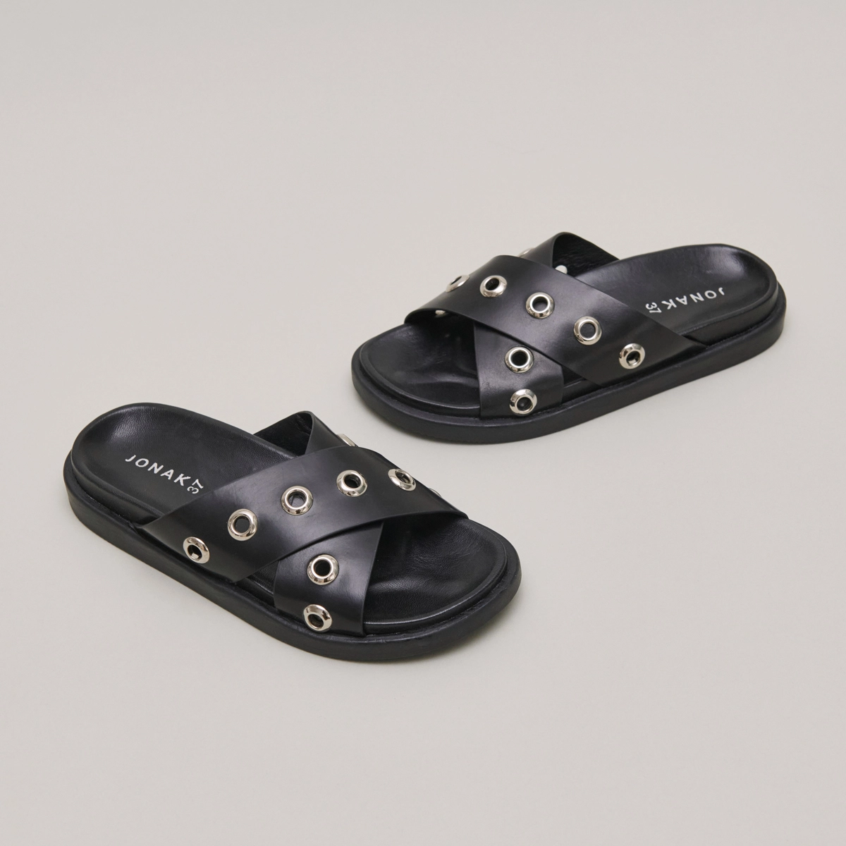 Open-toe mules with silver details in black leather | WYOMING