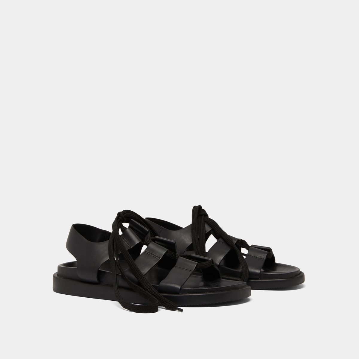 Sandals with multiple straps and laces in black leather | WELLINGTON