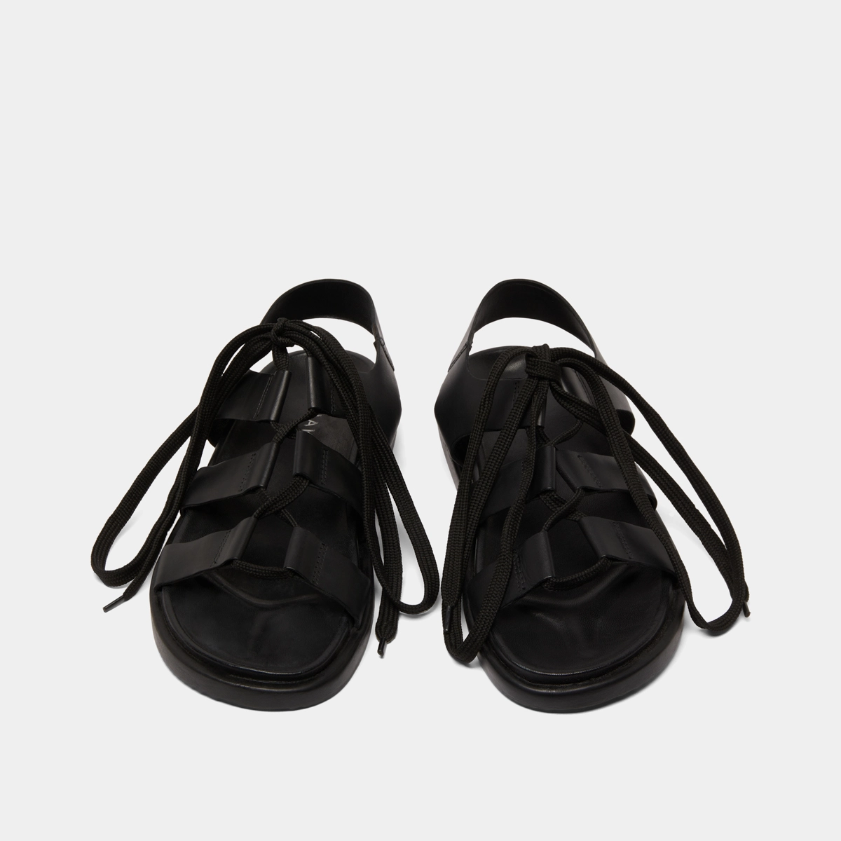 Sandals with multiple straps and laces in black leather | WELLINGTON