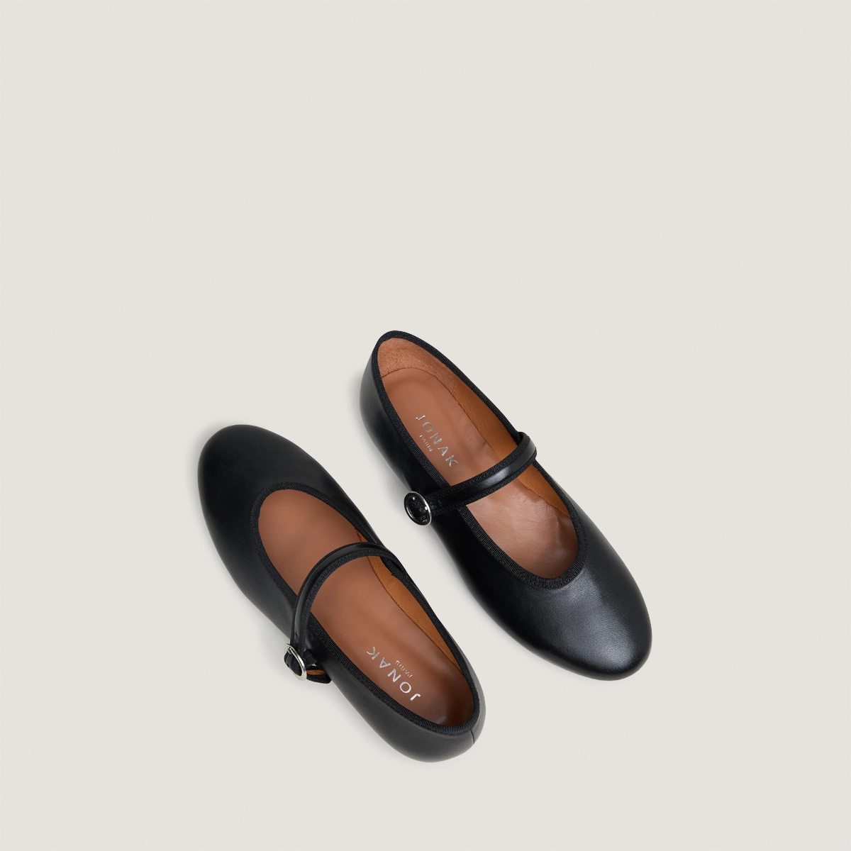 Ballet flats with straps and adjustable buckles in black leather | DEESSE