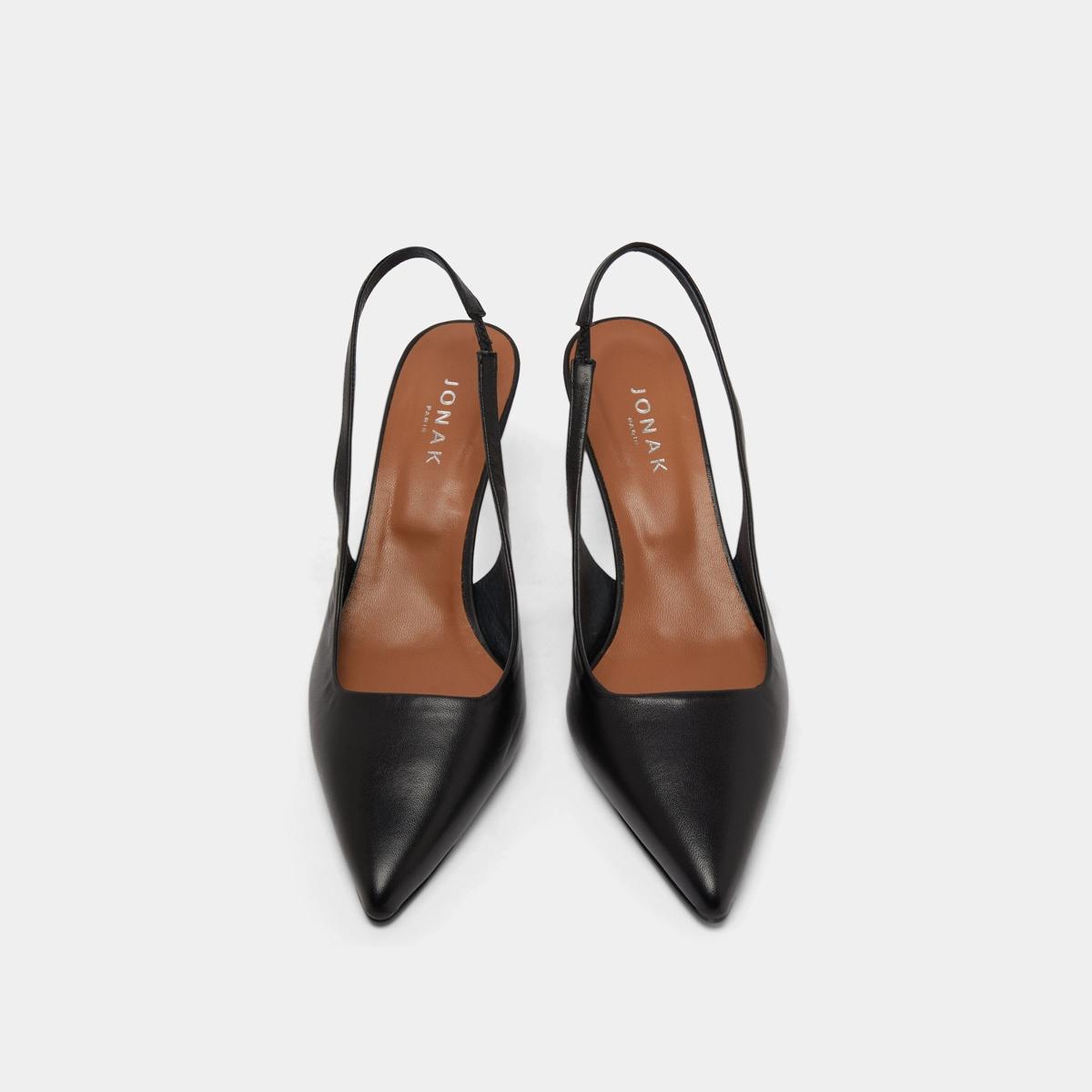 Pointed-toe pumps in black leather | DIAMANTINE