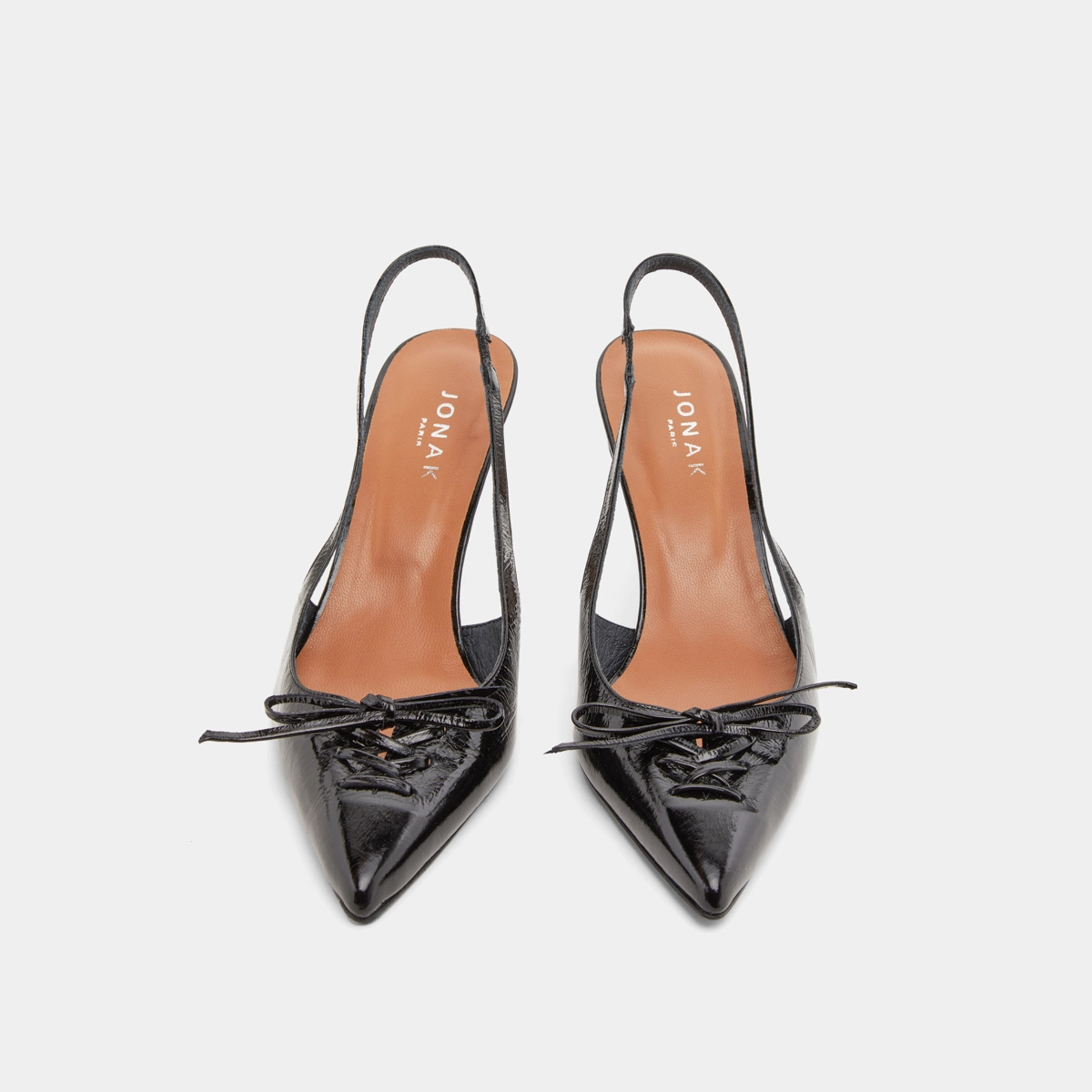 Pumps with open backs in shiny black leather | DOLENE