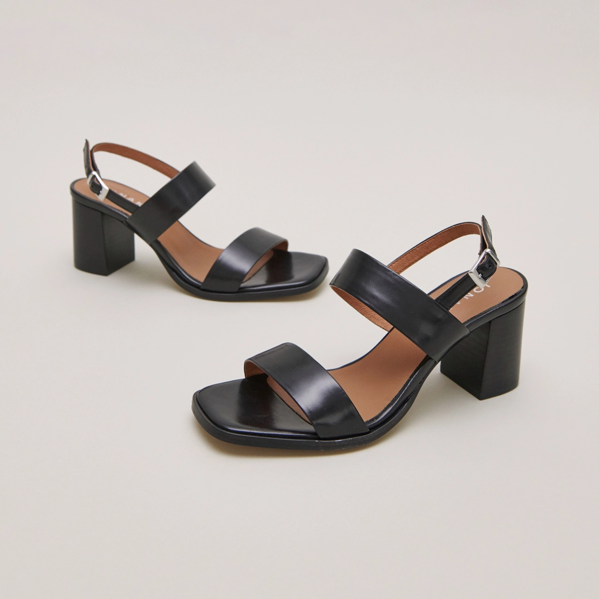 Heeled sandals in black leather | VALMONT