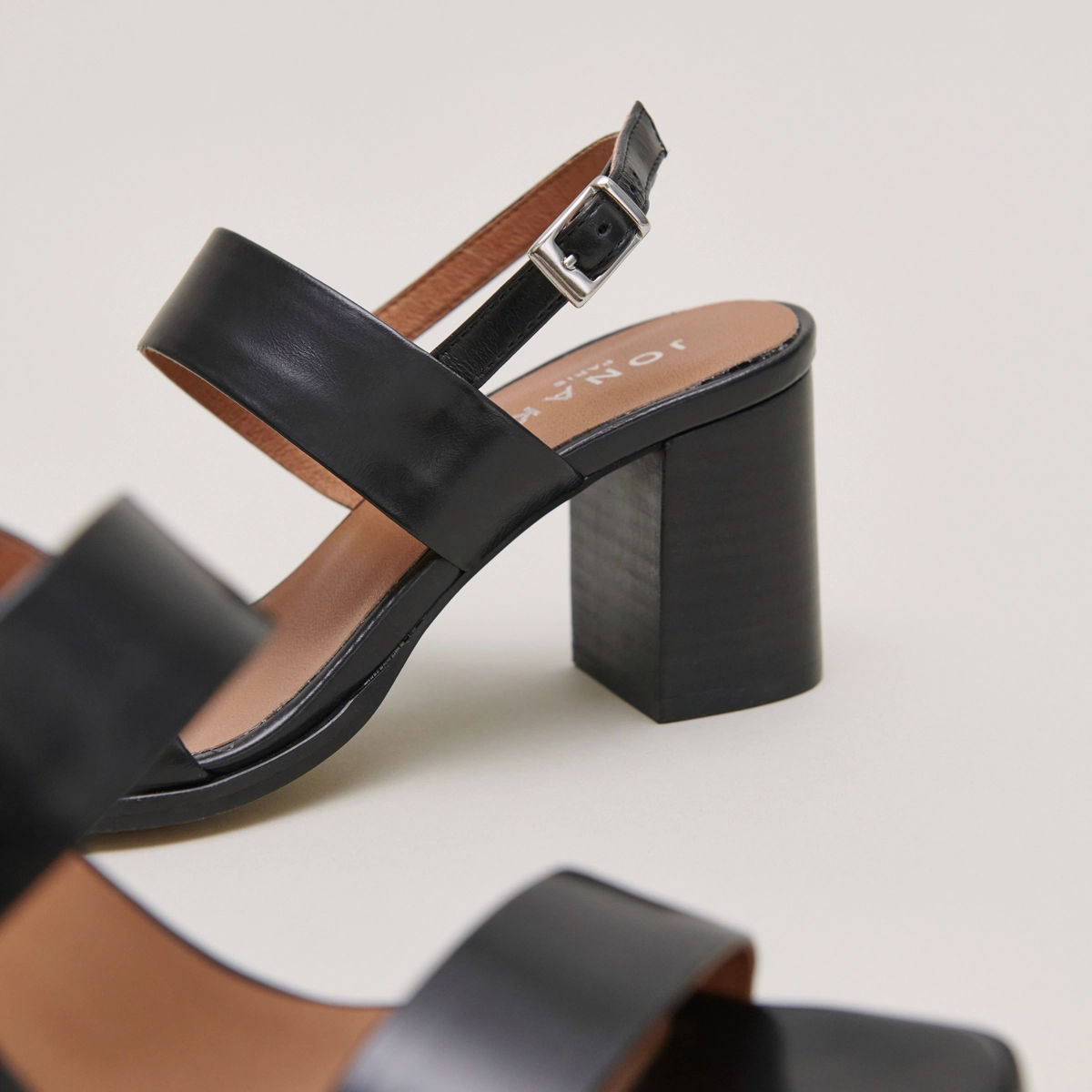 Heeled sandals in black leather | VALMONT