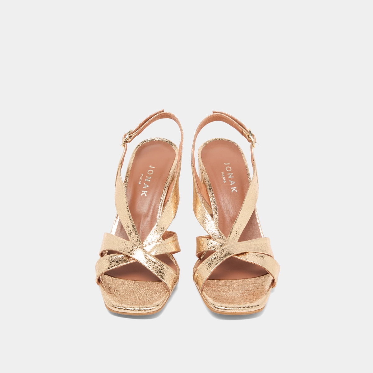 Heeled sandals in gold cracked leather | VANITY