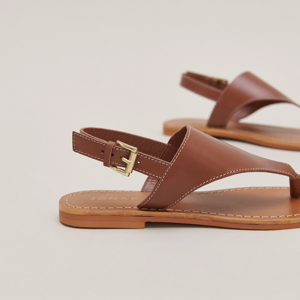 Plagettes with rear straps in cognac leather | WADE