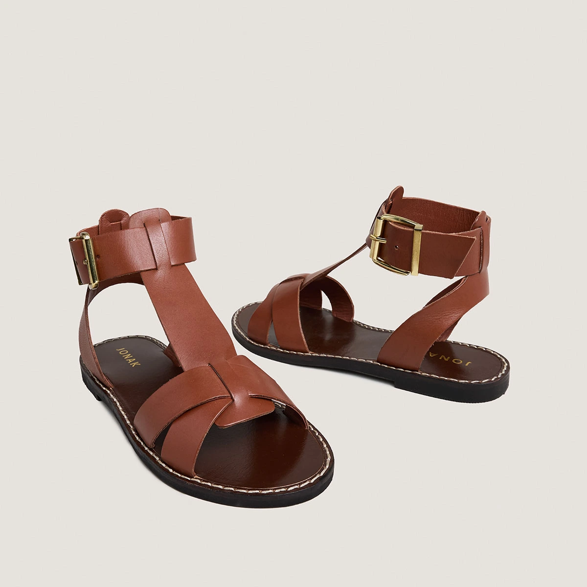 Buckle and strap sandals in cognac leather | WHISPER