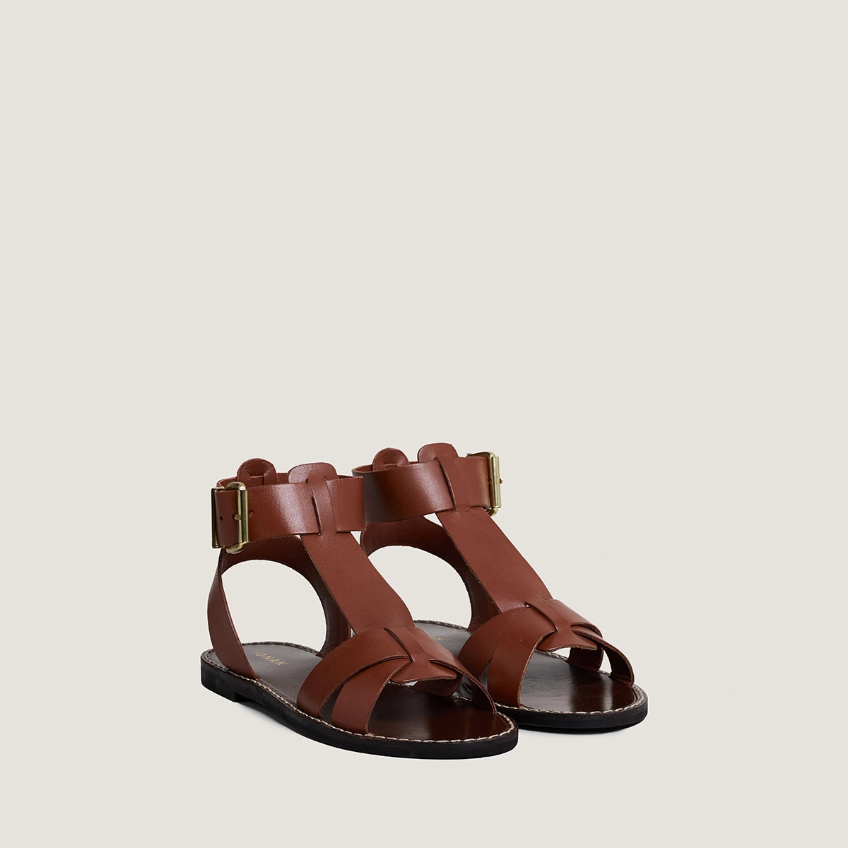 Buckle and strap sandals in cognac leather | WHISPER