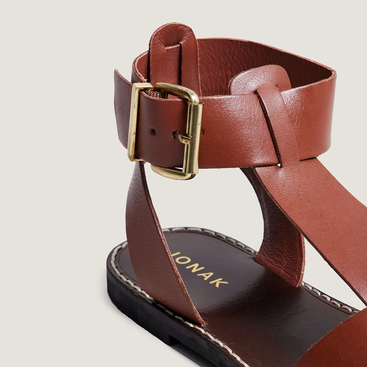 Buckle and strap sandals in cognac leather | WHISPER