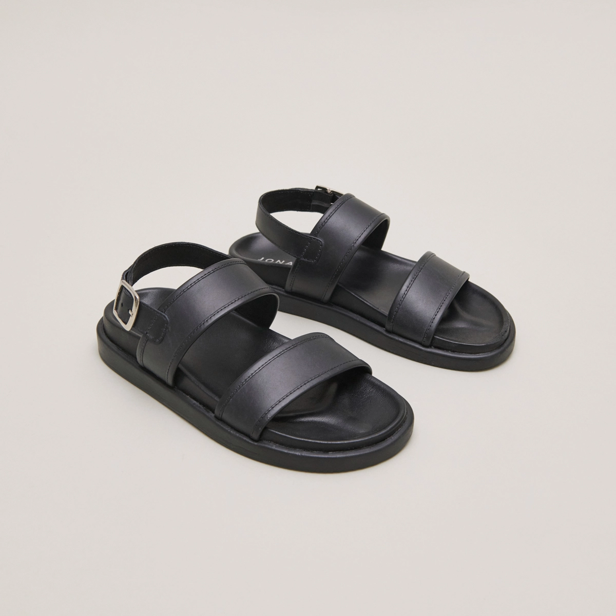 Sandals with double straps in black leather | WICHITA