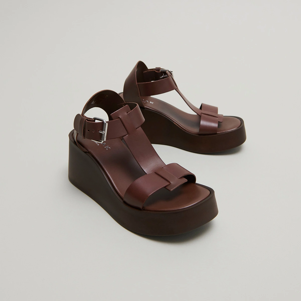 Wedge sandals with adjustable buckles in dark brown leather | ESTELLE