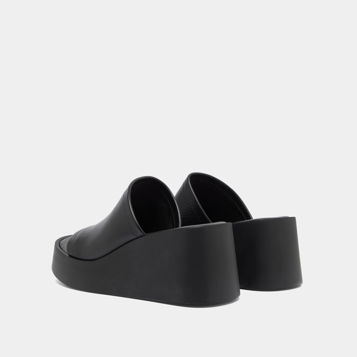 Wedge mules in black leather | EUGENE