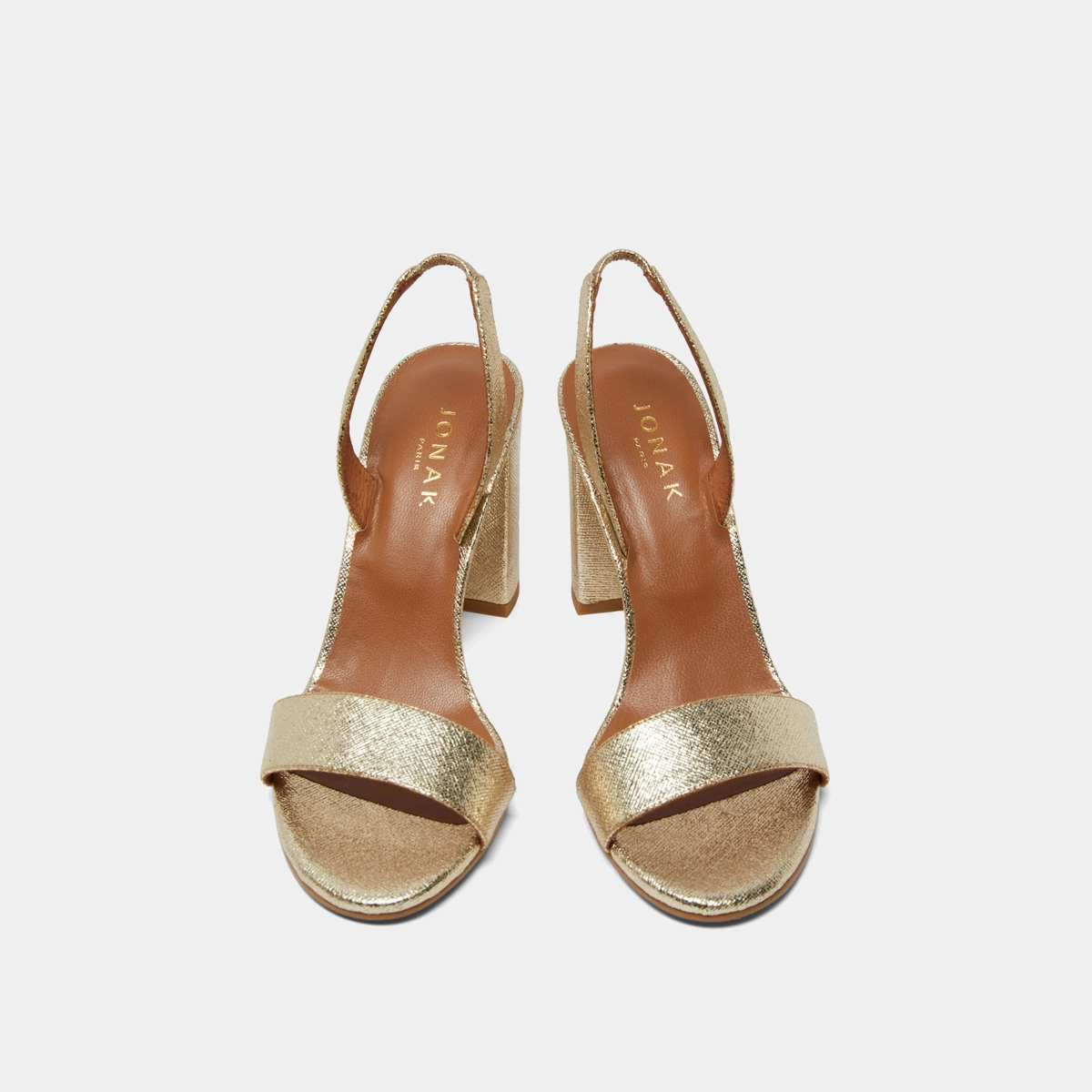 Heeled sandals in platinum metallic textile | DIDUS