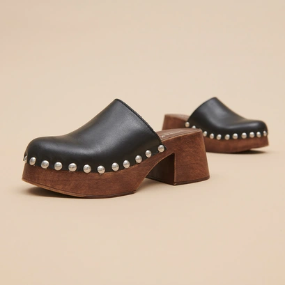 Platform mules in black leather | ELLIOT