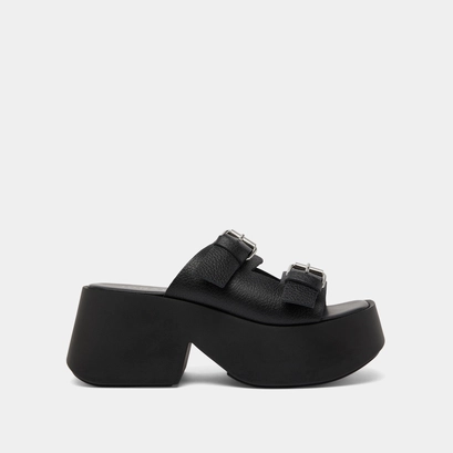 Mules with thick straps, buckles and open toes in black grained leather | ENOLA