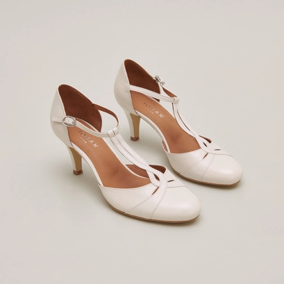 Heeled Mary Janes and adjustable buckles in ecru distressed leather | VERMEIL