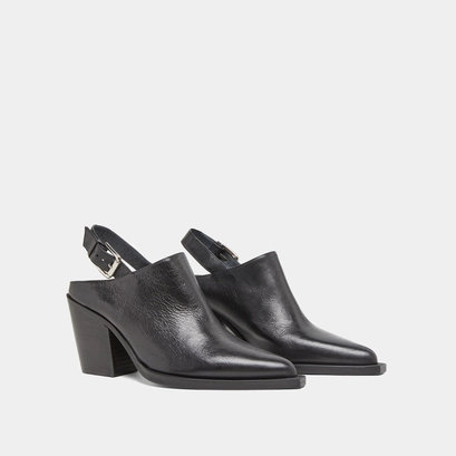 Mules with beveled heels in black leather | doren