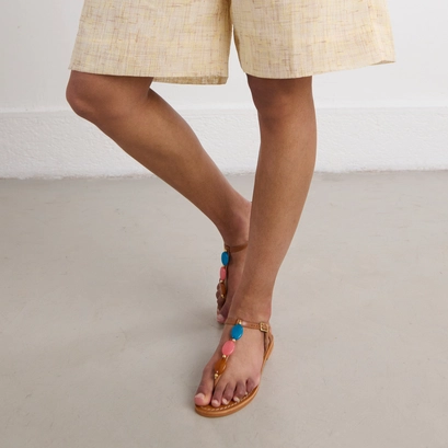 Plagettes with details in camel leather | walid
