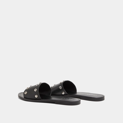 Mules with silver details in black grained leather | winslow